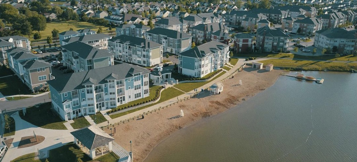 Overhead view of The District & Beach Side Apartments at Saxony Lake and Beach.